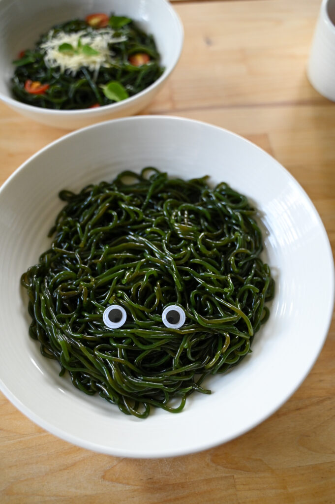 gluten-free pasta alternative seaghetti kelp pasta in a cute photo with googily eyes